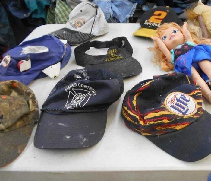 collection of hats damaged by smoke