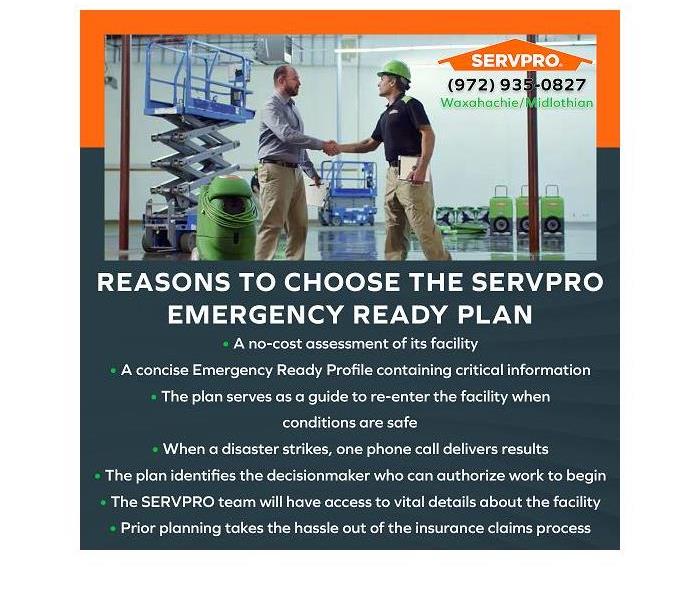 A SERVPRO technician shaking hands with a client